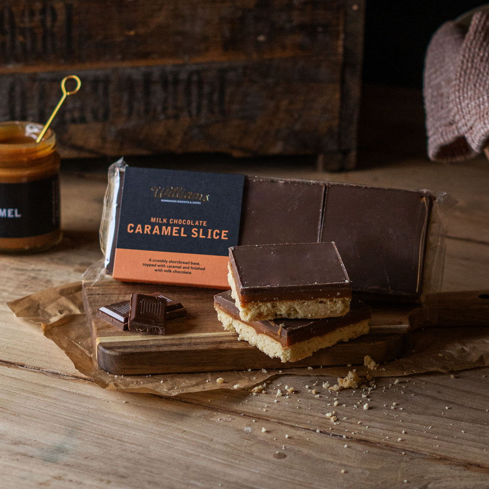 Milk Chocolate Caramel Slice, with two loose slices sat in the foreground.