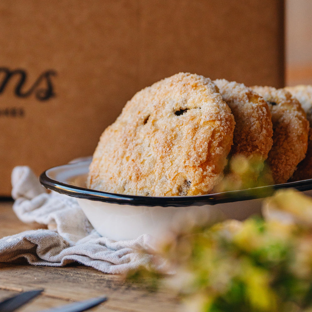 Luxury Eccles Cakes from Williams Handbaked in a white enamel dish.